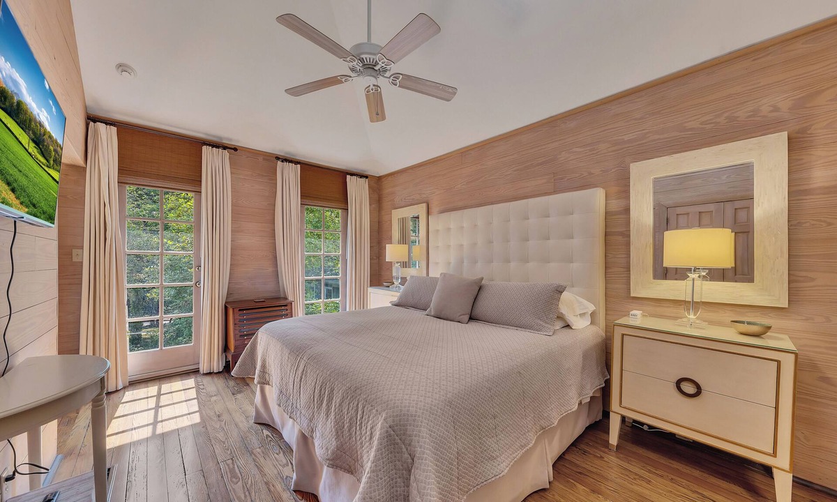 Buckhead House | Charming garden guest house tucked behind a gated driveway in Buckhead. King bed, full kitchen, washer/dryer, smart TVs, and private outdoor space.