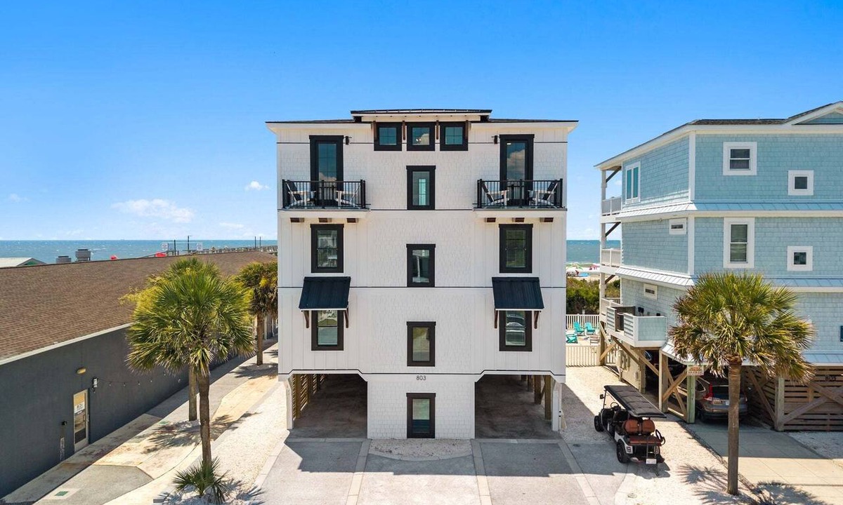 Yaupon Beach House | Experience luxury at 'How Suite It Is'—14-bedroom oceanfront retreat in Oak Island!