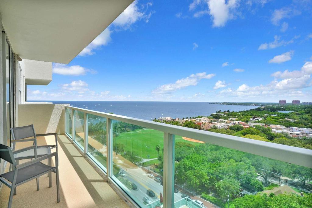 Coconut Grove Apartment | Modern 1BR at Arya Bay Views with Balcony and Pool