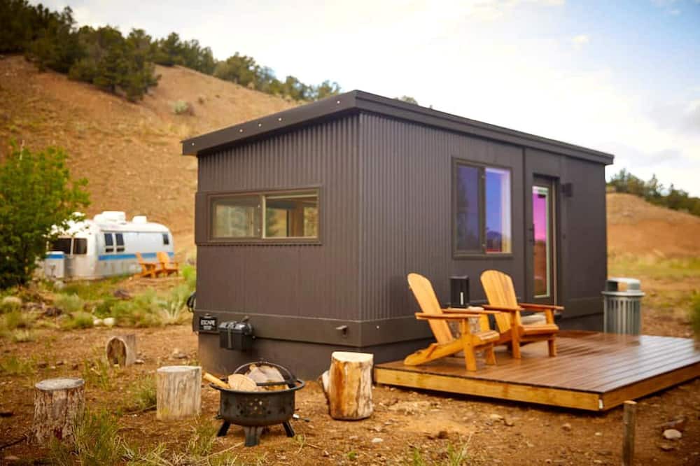 Arroyo Hondo Cabin | Rainbow Tiny Home with View & Hot Tub near Hot Springs, El Prado, NM