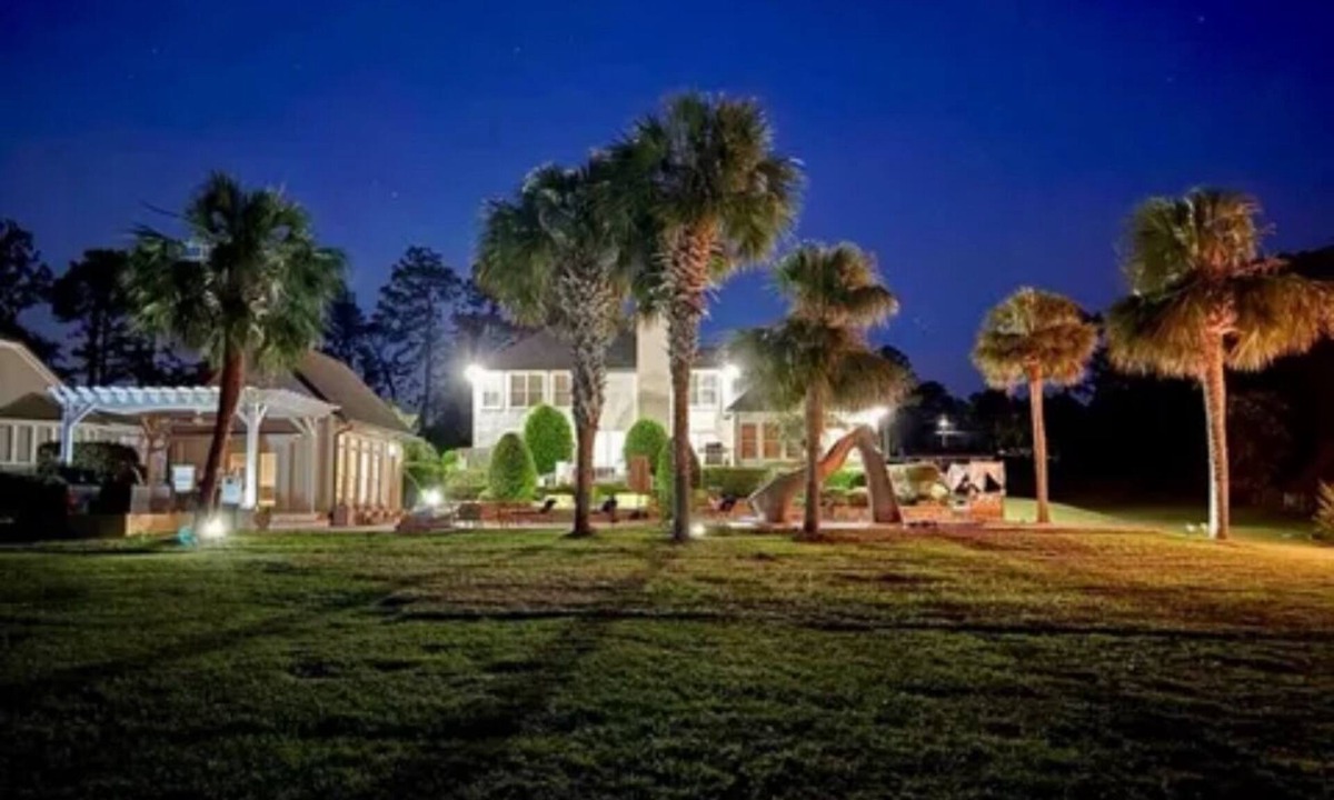 Douglas House | Resort style 5-bedroom lake house with white sand beach, pool, and pool house.