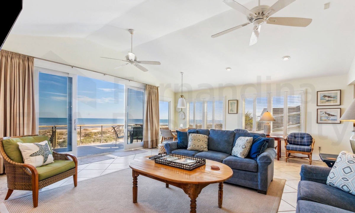 Fernandina Beach House | Spacious living area, windows across entire length of home.