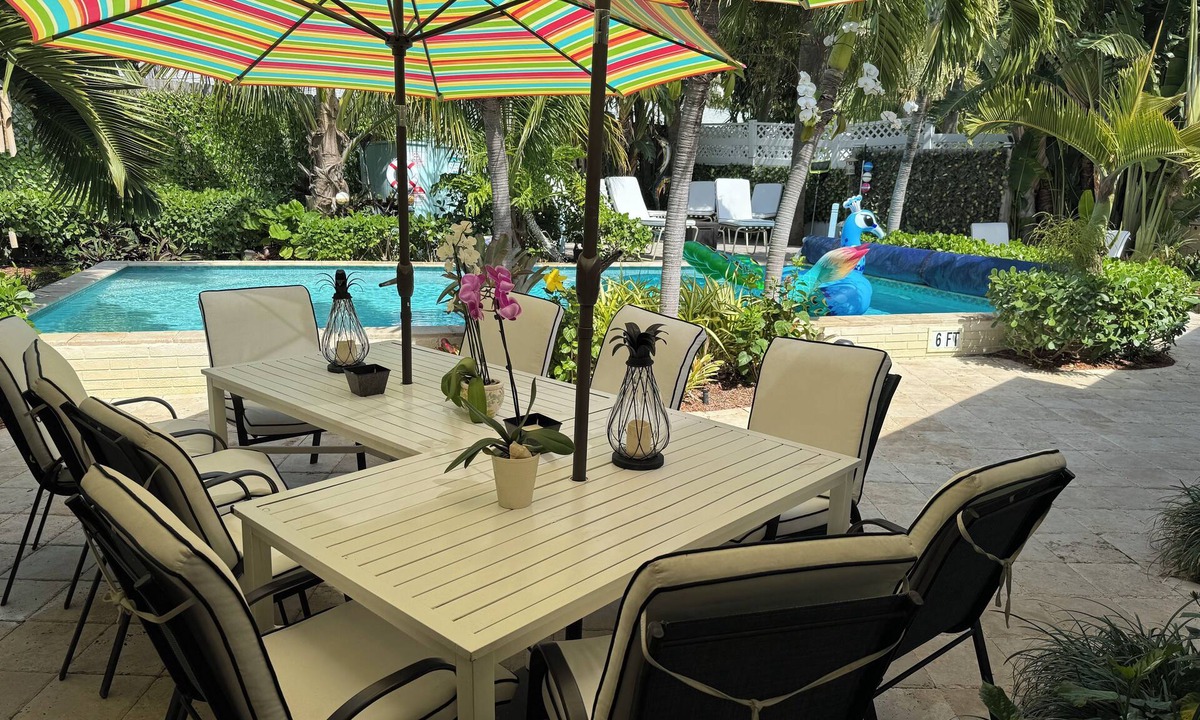 Singer Island House | Tropical Paradise Home Steps to Beach Heated Pool Game Rm Singer Island Retreat!