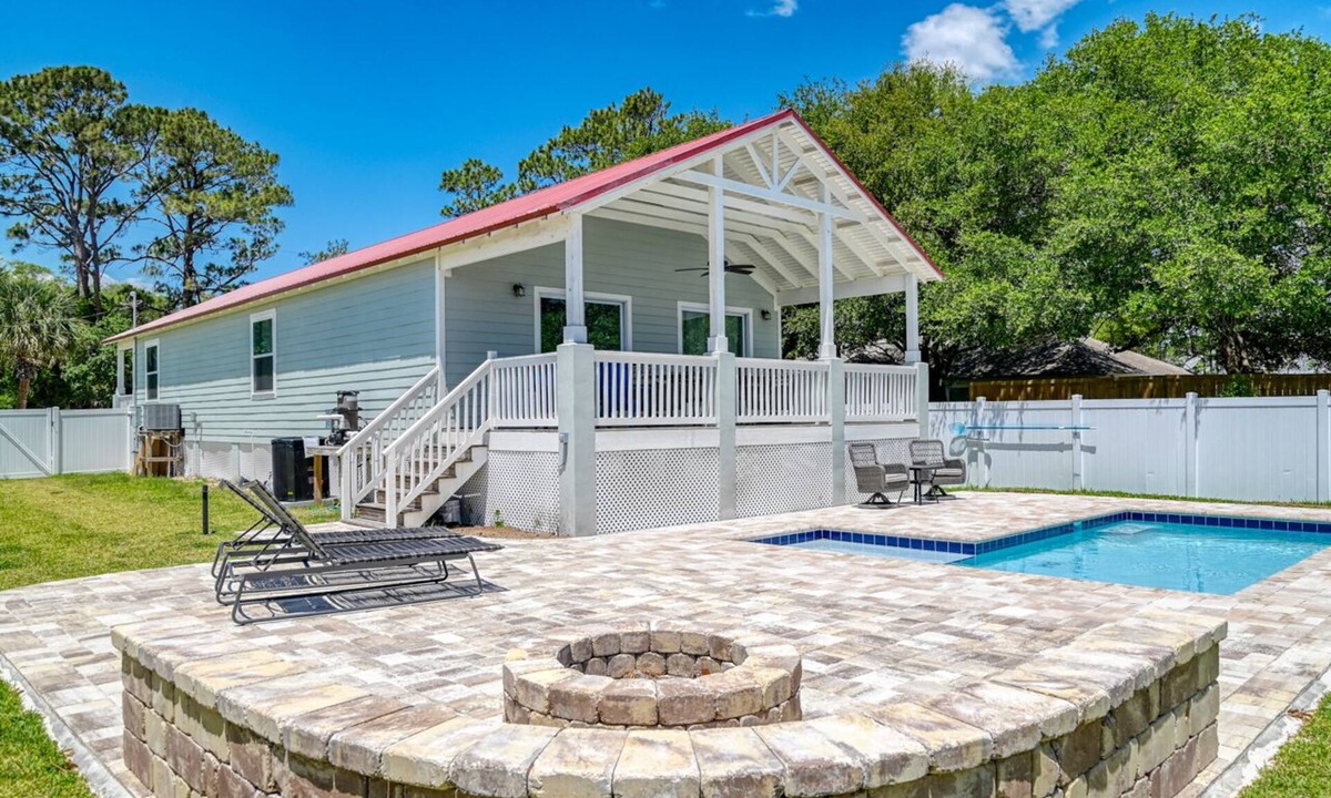 Butler Beach House | Tropical Winds - Heated Pool & Firepit! Walk to the Beach!