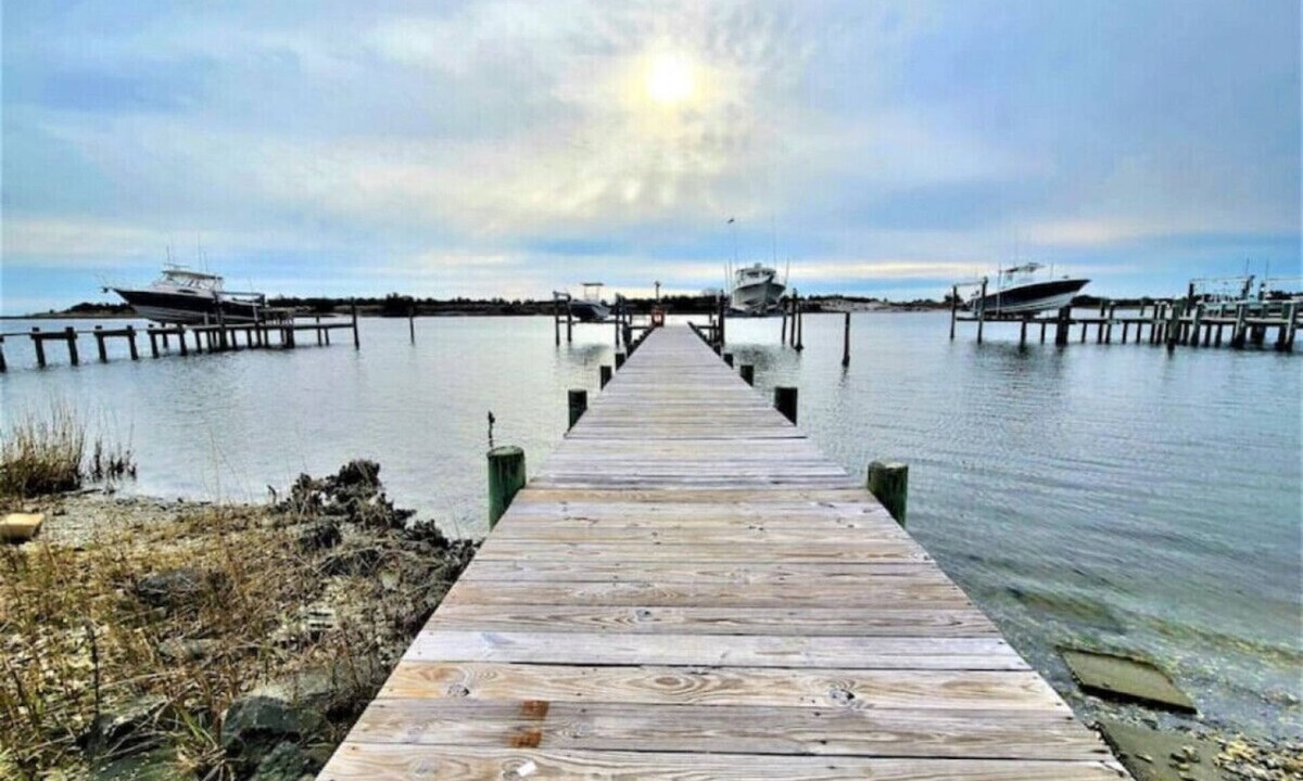Cedar Point House | Two Waterfront homes with two private docks, two hot tubs, Seven bedrooms and 4 bathrooms with boat lift.