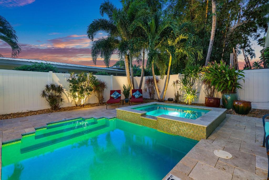 Del-Ida Park Historic District House | Walk to The Ave- Heated Pool, Spa, Golden Tee and Putting Green - mins to Beach- by Maven Vacation Rentals