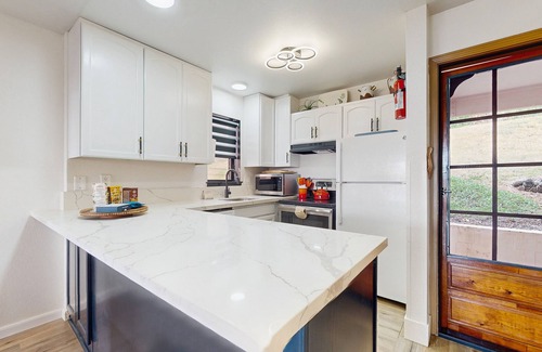 Nawiliwili Condo | Newly renovated condo with multiple lanais, A/C, heated saltwater pool & tennis