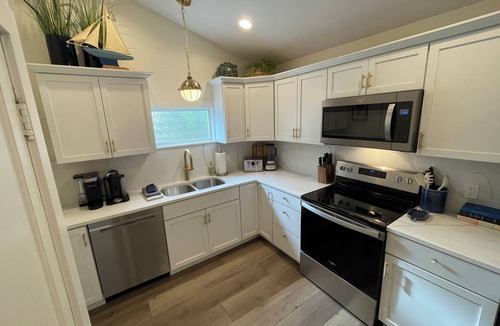 Saugatuck House | A Step Away: The Haven – Walk to Town Getaway~Dog Friendly~Fenced Yard~Fire Pit