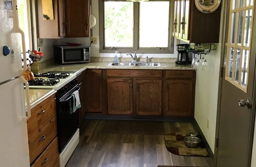 Irons House | AMAZING SUNSETS! Big Bass Lake Cottage! Swim,boat,fish!