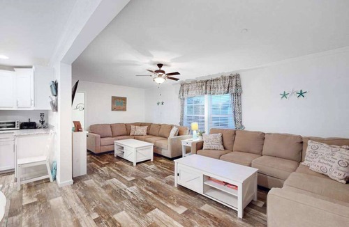 Montego Bay House | Beachy bayside home in quiet neighborhood with patio, central AC, pool, & tennis