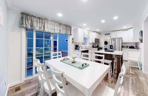 Montego Bay House | Beachy bayside home in quiet neighborhood with patio, central AC, pool, & tennis