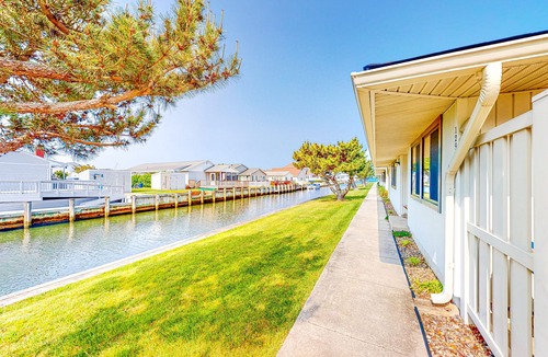 North Ocean City Condo | Canal-Front Retreat w/Pool - Walk to Beach & Restaurants