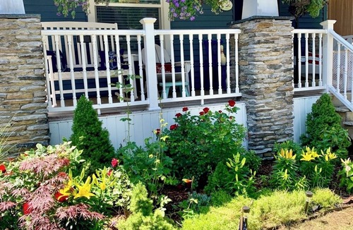 Ludington House | Charming 4-bedroom house sleeps 15 in the wonderful beach town of Ludington!