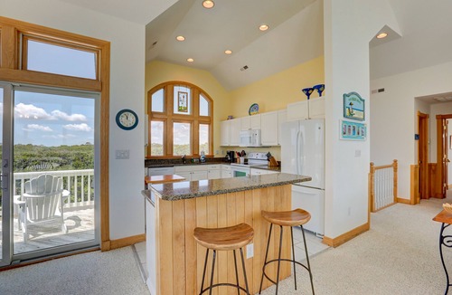 Pine Island House | Cheerful semi-oceanfront Corolla home w/private pool, hot tub, & gas fireplace
