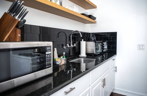 East Village Apartment | Chic Condo w Parking, AC and steps to Beach and Convention Center