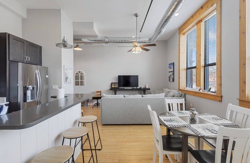 South Haven Condo | Chic Downtown Loft with pool, hot tub, gym, theatre, king bed, walk to town