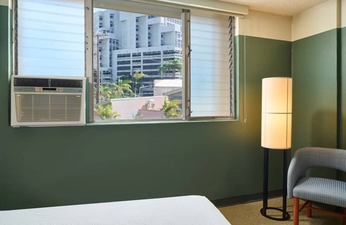 Ala Moana Hotel | City View Two Queens, 4 Family-Friendly Units, Tranquil Koi Ponds, Sun Deck View