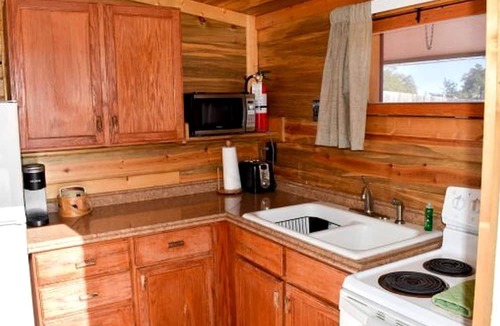 Red Feather Lakes Cabin | Classic Log Cabin with Fireplace in Red Feather Lakes, Perfect for a Romantic Weekend in the Rocky Mountains