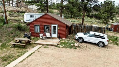 Red Feather Lakes House | Classic Log Cabin with Fireplace in Red Feather Lakes, Perfect for a Romantic Weekend in the Rocky Mountains