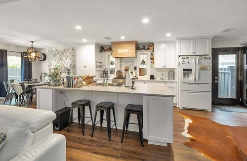Saint Simons Heights House | Coastal Cowbell | Luxury 3BR Saltwater Pool Home St. Simons Island Near Beach