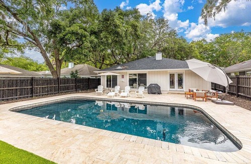 Saint Simons Heights House | Coastal Cowbell | Luxury 3BR Saltwater Pool Home St. Simons Island Near Beach