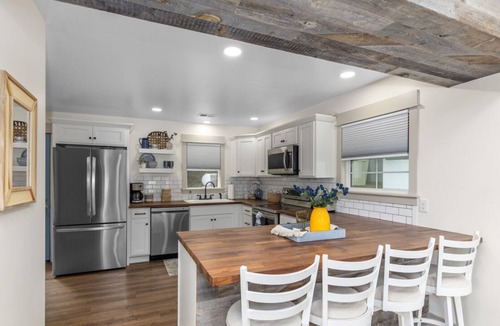 Greenville Cottage | Cottage on the Lake w/pontoon! SUP boards, kayaks, hot tub, fire pit & fishing!