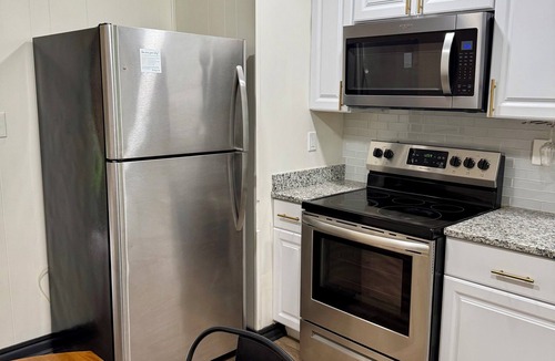 Covington House | Covington Sq Apt, Patio & Work