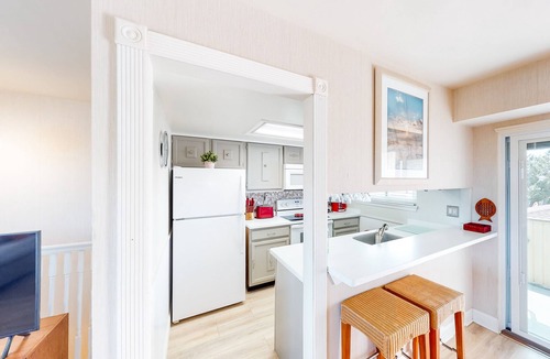 North Ocean City Condo | Cozy canal-side condo with pool, bay views, central AC, & deck - walk to beach