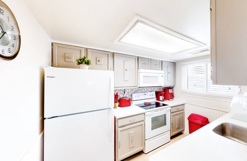 North Ocean City Condo | Cozy canal-side condo with pool, bay views, central AC, & deck - walk to beach