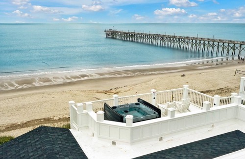 Yaupon Beach House | Discover Suite Emotion: an oceanfront retreat in Oak Island with 14 spacious bedrooms.