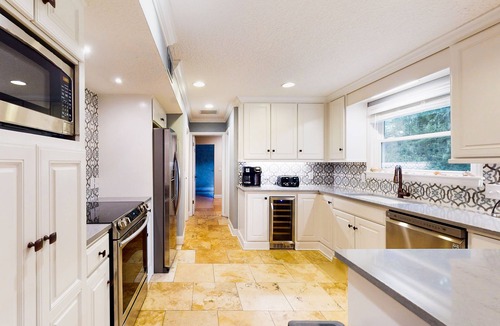 Saint Simons Island House | Dog-friendly home with central AC, washer/dryer & spacious backyard - near beach