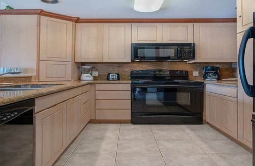 Lihue Condo | East Kauai OV Bliss! Open Kitchen, Lanai, WiFi, TV, DVD+Ceiling Fans–Kaha Lani 321