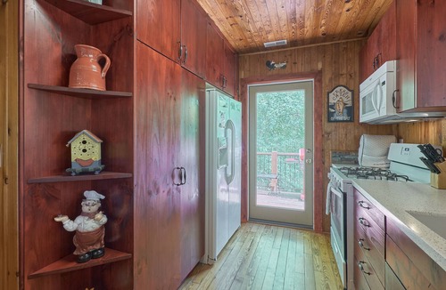 Sunset Cove Cottage | Enjoy the sunrise in the trees at Lake Lure