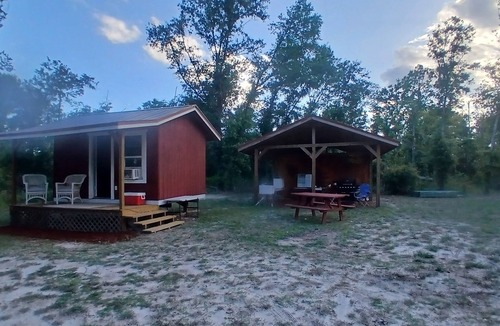 Mayo Cabin | Friendlys River Retreat private Rustic Camping Cabin sleeps 4+with tent camping