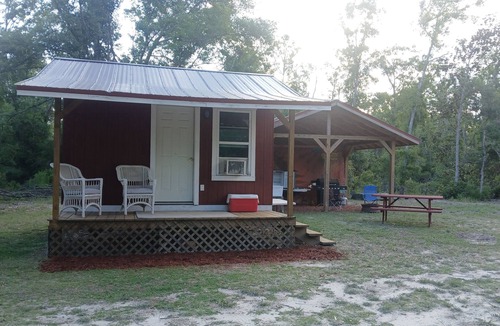 Mayo Cabin | Friendlys River Retreat private Rustic Camping Cabin sleeps 4+with tent camping