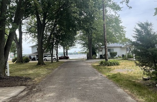 Manitou Beach-Devils Lake Cottage | Guest favorite Devils Lake Dock Private Fenced Yard Blackstone Grill