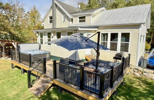 Montgomery Center House | Inviting riverfront home with hot tub on deck & fireplace, near skiing & golf