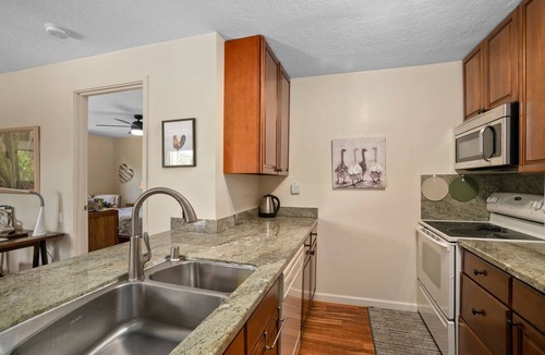 Hanamaulu Condo | Kauai Beach Villas E-15 view the Freshwater Lagoon & Tropical Garden