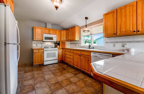 Town of Milo House | Lakefront gem with game room and dock - the house that almost floated away