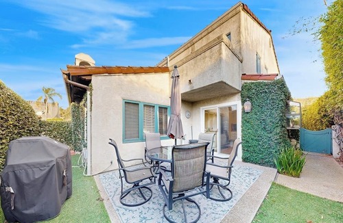East Beach House | Lovely home with furnished patio, grill & ocean views - close to the beach