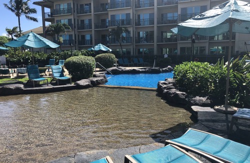 Kapaa Condo | Luxury Condo-2Waterslides, 3 hottubs, huge pool, BBQ’s, AC, WiFi & 3-75” TV’s