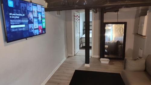 Candler-McAfee House | Lynn Iris Basement Suite with Sitting Area Shared Bathroom & Common Areas