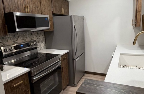 Ferrysburg Condo | Modern Spring Lake Retreat | Walk to Coast Guard Park