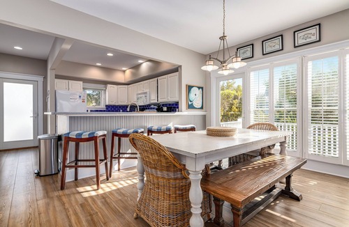 South Beach House | Ocean front duplex with master balcony overlooking the beach; newer six passenger golf cart