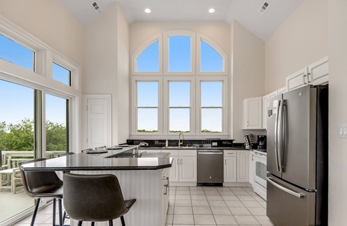Pine Island House | Partial ocean-view home In Corolla with heated pool, hot tub, & rec room