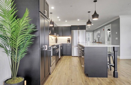 Waterville Apartment | Penthouse 1-bedroom corporate apartment in Downtown Waterville!