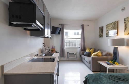 South Pointe Apartment | Perfect stay right on the BEACH with POOL!