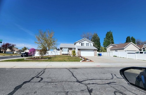 West Jordan House | Private bedroom with a shared bathroom in west jordan