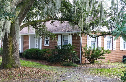 Woodbine House | Relax on the Screened Porch or Enjoy the Nearby Area Attractions