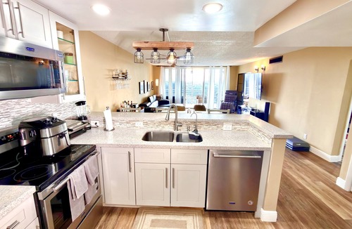 Survey Creek Condo | Renovated 3 bedroom 2 bath condo on the 8th floor overlooking the golf course.